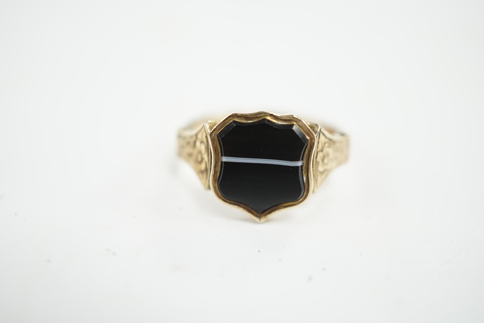 A Victorian yellow metal and banded and agate set signet ring, size P/Q, gross weight 3 grams. Condition - poor